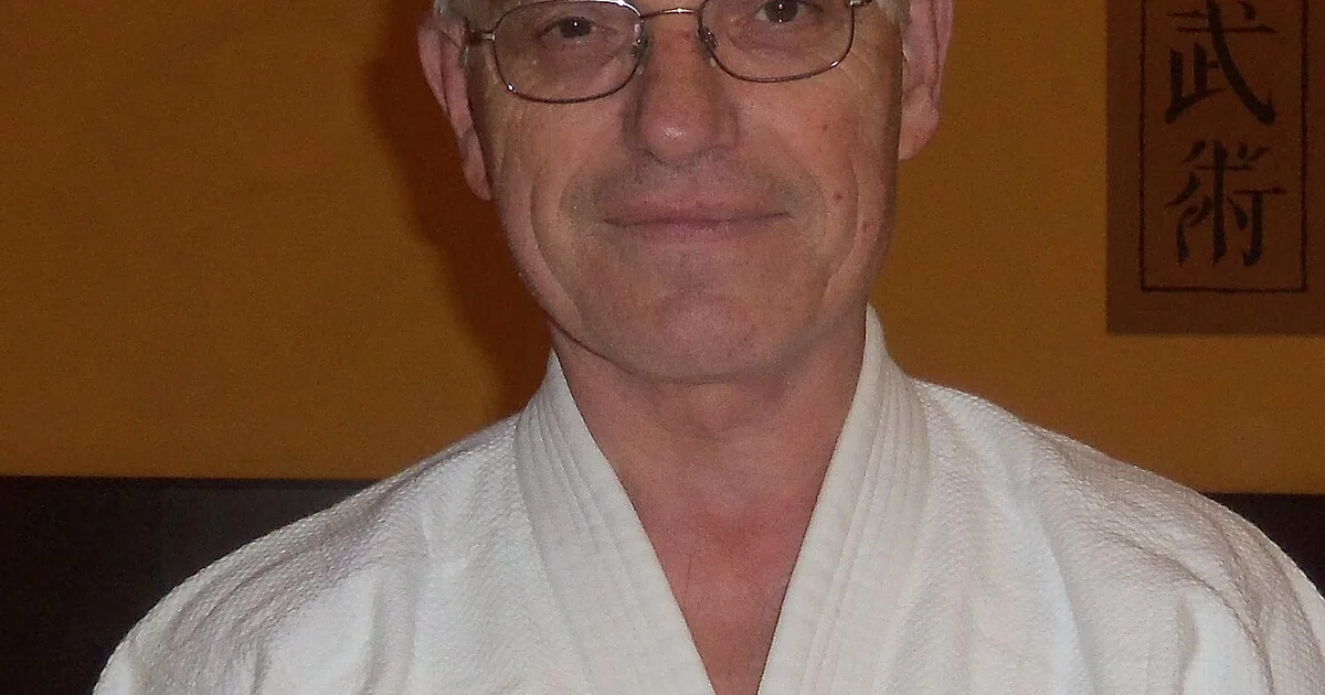 Aikido nage (thrower) redirecting uke's wrist into shiho-nage alongside a judoka executing seoi-nage shoulder throw — illustrating the philosophical and mechanical split between the two arts