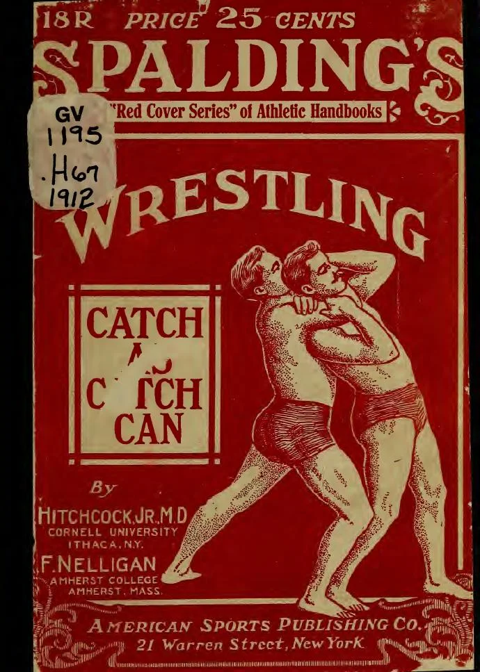 Spalding's "Wrestling: Catch-as-Catch-Can Style" (1912, Hitchcock & Nelligan) — атлетическият наръчник с червена корица за 25 цента, който кодифицира техниката на catch wrestling за цяло поколение американски грапли, включително врата и главата, които предшестваха съвременния headscissors.