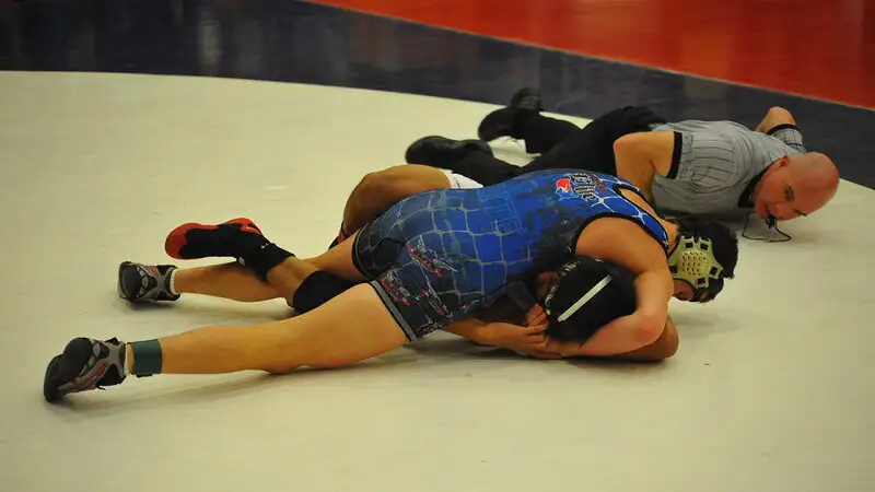 A wrestling match showing ground control and pin technique — the fundamentals that make the spladle effective. CC BY-SA 2.0 by Chris Hunkeler via Flickr