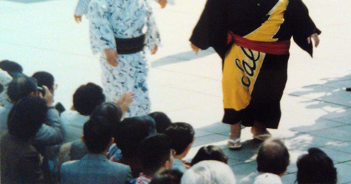 Wrestling double-leg takedown entry versus BJJ armbar from guard — the two grappling disciplines that together define the modern MMA ground game.